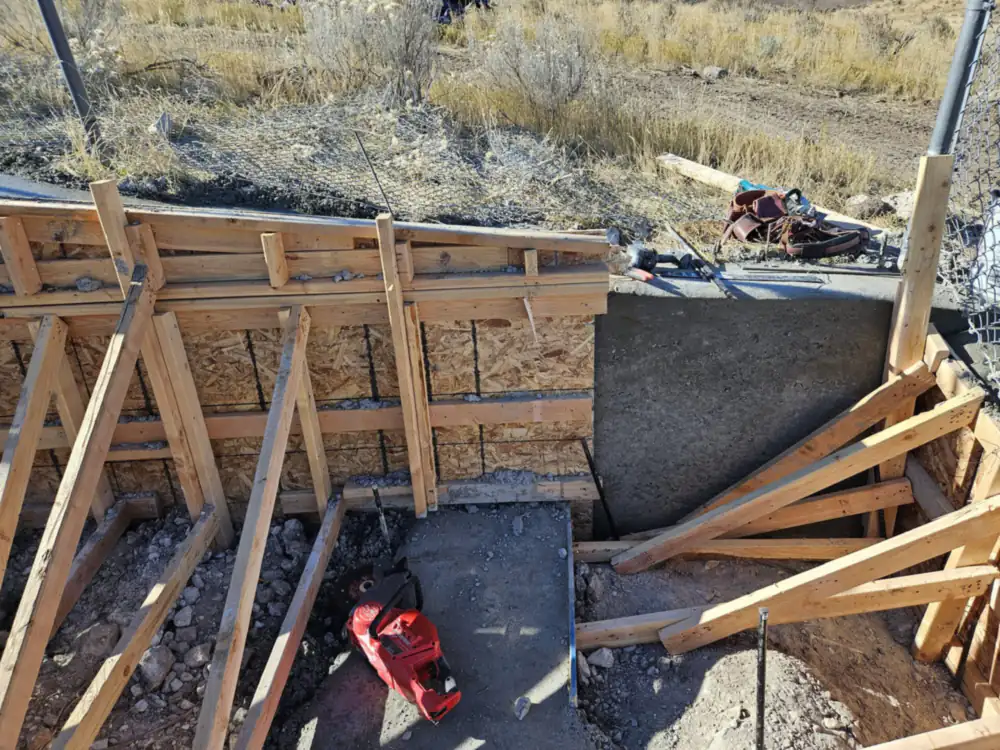 Concrete wall forms and bracing