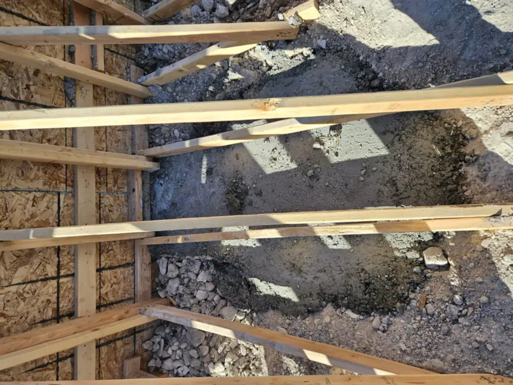 Footing forms over excavation